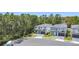 These modern homes have gray and white exteriors, landscaped yards, and two car garages at 1326 Butterfly Orchid Rd, Davenport, FL 33837
