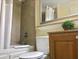 Bathroom featuring granite counters, a shower with a shower curtain, and tiled walls at 13415 Blue Heron Beach Dr # 304, Orlando, FL 32821