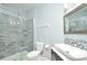 Modern bathroom featuring a glass shower, stylish tiling, and a vessel sink at 1357 Venezia Ct # 202, Davenport, FL 33896