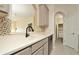 Kitchen with white countertops, black faucet, and tiled backsplash at 1357 Venezia Ct # 202, Davenport, FL 33896