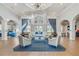 Elegant clubhouse lobby with stylish seating, wood floors, and bright, welcoming atmosphere at 1357 Venezia Ct # 202, Davenport, FL 33896