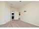 Inviting main bedroom showcasing neutral tones and access to bath and additional living space at 1357 Venezia Ct # 202, Davenport, FL 33896