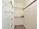 Spacious walk-in closet with custom shelving and ample storage at 1357 Venezia Ct # 202, Davenport, FL 33896