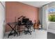 Trendy room displaying a modern work area, sleek desk, and guitars by the window creating the perfect space at 1559 Wescott Loop, Winter Springs, FL 32708