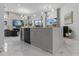 Modern kitchen island featuring stainless steel appliances, pendant lighting, and open floor plan at 1559 Wescott Loop, Winter Springs, FL 32708