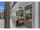 Outdoor patio seating with a view of the pool area providing relaxation and entertainment at 1559 Wescott Loop, Winter Springs, FL 32708