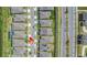An aerial shot showcasing a residential neighborhood with well-maintained homes and proximity to amenities at 2019 Spring Shower Cir, Kissimmee, FL 34744