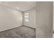 Cozy bedroom with carpet flooring and window allowing natural light at 2019 Spring Shower Cir, Kissimmee, FL 34744