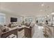 Spacious living room with elegant decor, marble floors, and modern design at 2019 Spring Shower Cir, Kissimmee, FL 34744