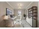 Stylish home office with modern furniture, decor, and marble flooring at 2019 Spring Shower Cir, Kissimmee, FL 34744