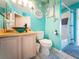 Nautical themed bathroom with a unique glass bowl sink, decorative accents, and combined shower/tub at 20249 Macon Pkwy, Orlando, FL 32833