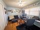 Bedroom with a ceiling fan, work desk, and a seating area for relaxing and productivity at 20249 Macon Pkwy, Orlando, FL 32833