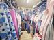 Spacious walk-in closet with clothing racks and shelves, perfect for organized storage at 20249 Macon Pkwy, Orlando, FL 32833