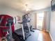 Home gym featuring various exercise machines, including a treadmill and full weight set at 20249 Macon Pkwy, Orlando, FL 32833