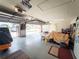 Spacious garage with an open garage door and extra storage areas at 20249 Macon Pkwy, Orlando, FL 32833