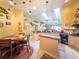 Spacious kitchen featuring skylights, pendant lights, and a cozy dining area at 20249 Macon Pkwy, Orlando, FL 32833