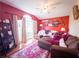 Comfortable living room with plush seating, an accent wall, and ample natural light at 20249 Macon Pkwy, Orlando, FL 32833
