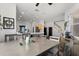 Open concept dining room with modern style and easy access to kitchen and game room at 206 Bonville Dr, Davenport, FL 33897