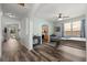 Spacious game room featuring a pool table, dark wood floors, and backyard access at 206 Bonville Dr, Davenport, FL 33897