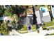 A bird's eye view of a home, featuring a well-maintained yard, driveway, and proximity to neighborhood amenities at 2227 Coventry Dr, Winter Park, FL 32792
