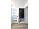 Modern bathroom with glass shower door and a white wooden door with glass panels at 2227 Coventry Dr, Winter Park, FL 32792