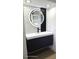 Bathroom with a round LED mirror, sleek vanity, and modern black accents at 2227 Coventry Dr, Winter Park, FL 32792