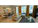Bright living room showcases an open-concept design with stylish furniture and access to outdoor entertainment at 228 Captiva Dr, Davenport, FL 33896