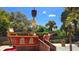 View of a themed splash pad with a pirate ship and playful water features for endless entertainment at 228 Captiva Dr, Davenport, FL 33896