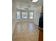 Bright dining area with large windows and neutral tile flooring at 2305 Chatham Place Dr, Orlando, FL 32824