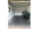 A clean and organized garage with ample space for parking and storage solutions at 2305 Chatham Place Dr, Orlando, FL 32824