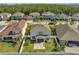 Overhead view of the property highlights the manicured backyard, patio, and surrounding neighborhood at 2348 Pearl Cider St, Orlando, FL 32824