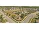 Bird's eye view featuring a neighborhood playground with a pool, clubhouse and soccer field nearby at 2348 Pearl Cider St, Orlando, FL 32824
