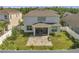 Well-maintained backyard with a screened-in porch and a paver patio, perfect for outdoor enjoyment at 2348 Pearl Cider St, Orlando, FL 32824