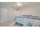 Inviting bedroom with a light neutral color scheme and ceiling fan provides a relaxing retreat at 2348 Pearl Cider St, Orlando, FL 32824