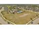 Community amenities include a pool, clubhouse, and vast sports field, creating a vibrant living environment at 2348 Pearl Cider St, Orlando, FL 32824