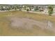 Expansive community field, perfect for outdoor activities, surrounded by well-maintained homes at 2348 Pearl Cider St, Orlando, FL 32824