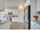 Bright kitchen featuring stainless steel appliances, granite countertops, and ample cabinet space at 2348 Pearl Cider St, Orlando, FL 32824