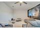 Spacious living room with comfortable seating, modern ceiling fan, and ambient lighting at 2348 Pearl Cider St, Orlando, FL 32824