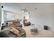 Upstairs living area featuring neutral carpeting and comfortable seating for relaxing and entertaining at 2348 Pearl Cider St, Orlando, FL 32824