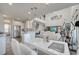 Open-concept living room with kitchen and dining area at 2348 Pearl Cider St, Orlando, FL 32824