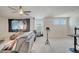 The upstairs living room features comfortable seating, natural light, and a neutral color palette at 2348 Pearl Cider St, Orlando, FL 32824