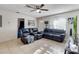 Comfortable living room featuring tile floors, comfortable seating, and a bright, airy ambiance at 2535 Georgia Ave, Sanford, FL 32773