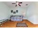 This bedroom features a bright window, laminate flooring and calming décor for a relaxing atmosphere at 271 Falling Waters Dr, Kissimmee, FL 34759