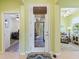 Bright foyer features neutral colors and natural light, creating a warm and inviting entrance at 2724 Palm Tree Dr, Poinciana, FL 34759