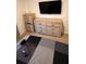 Bedroom boasts matching dressers and a wall-mounted television at 3041 Tobago Dr, Haines City, FL 33844