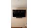 Modern living room featuring a large flat screen TV and sound bar mounted on the wall at 3041 Tobago Dr, Haines City, FL 33844