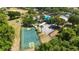 Overhead view of basketball court, pool, community center, playground, and parking at 3111 Turnberry Blvd, Kissimmee, FL 34744