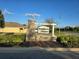 Summers Corner street sign is clearly visible at the entrance to the community, surrounded by nice landscaping at 320 Aberdeen Dr, Davenport, FL 33896