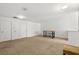 Upstairs bonus room or loft area with a table and bar stools at 3610 Rodrick Cir, Orlando, FL 32824
