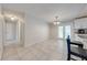 Cozy dining area with french doors that lead to the kitchen with granite countertops at 412 Noya Ln, Apopka, FL 32712
